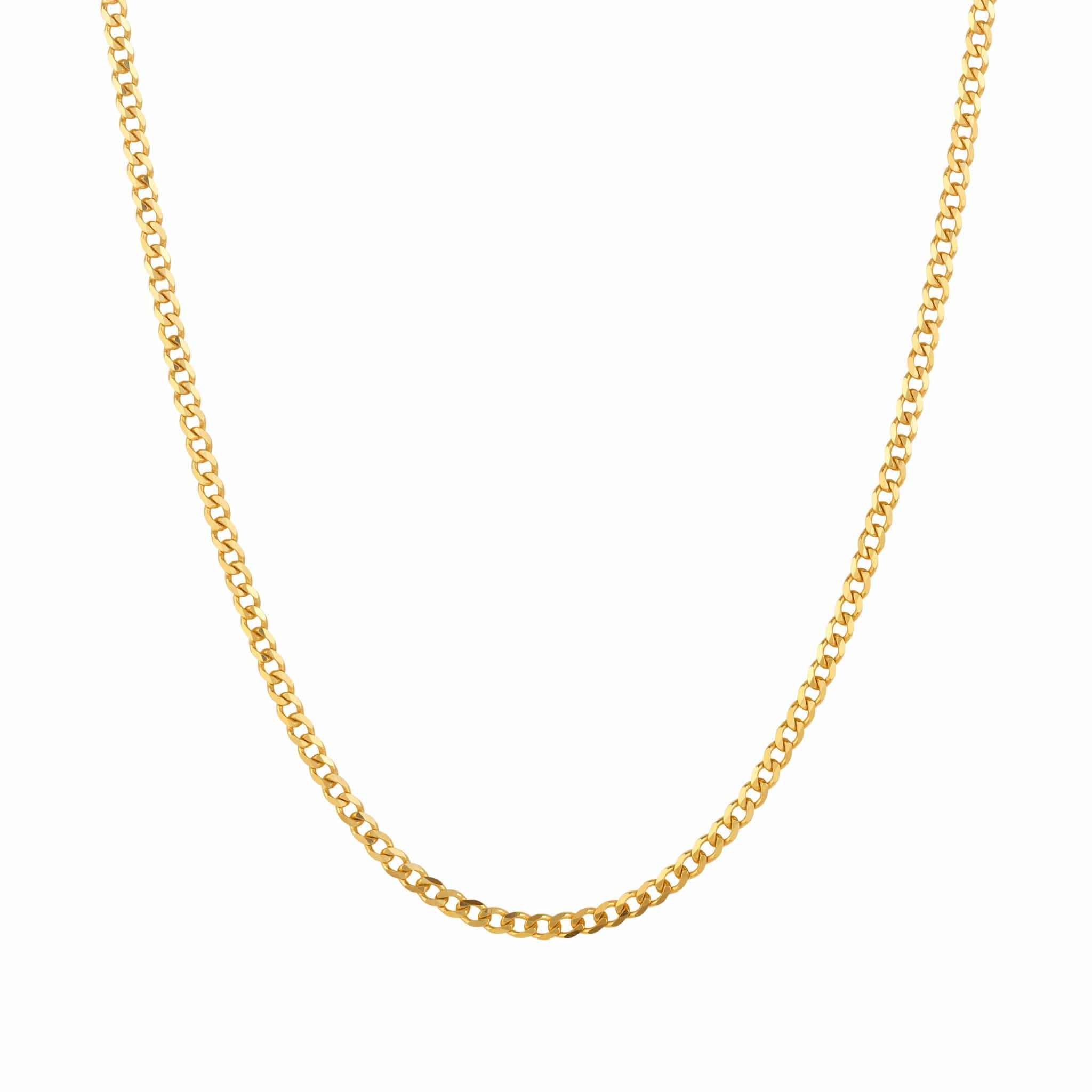 A dainty gold anklet displayed against a white background.