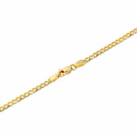 A close-up of the clasp on a thin gold curb chain necklace.