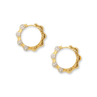 Side view of hourglass gold diamond statement earrings