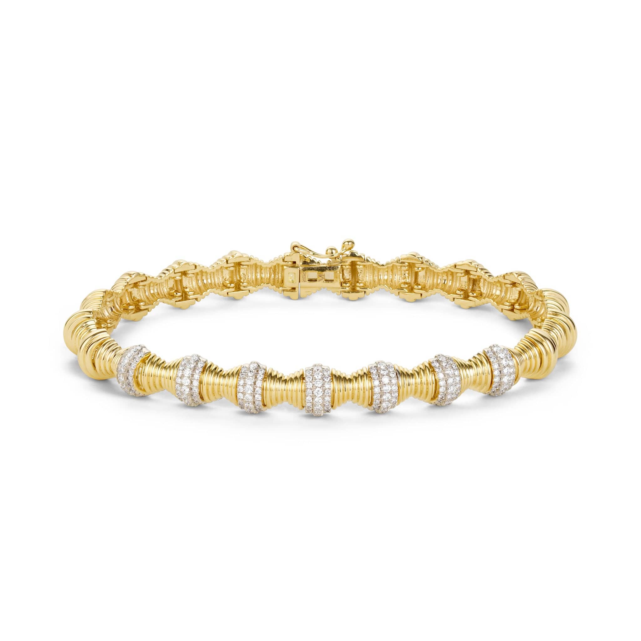 Front view of hourglass gold statement bracelet 