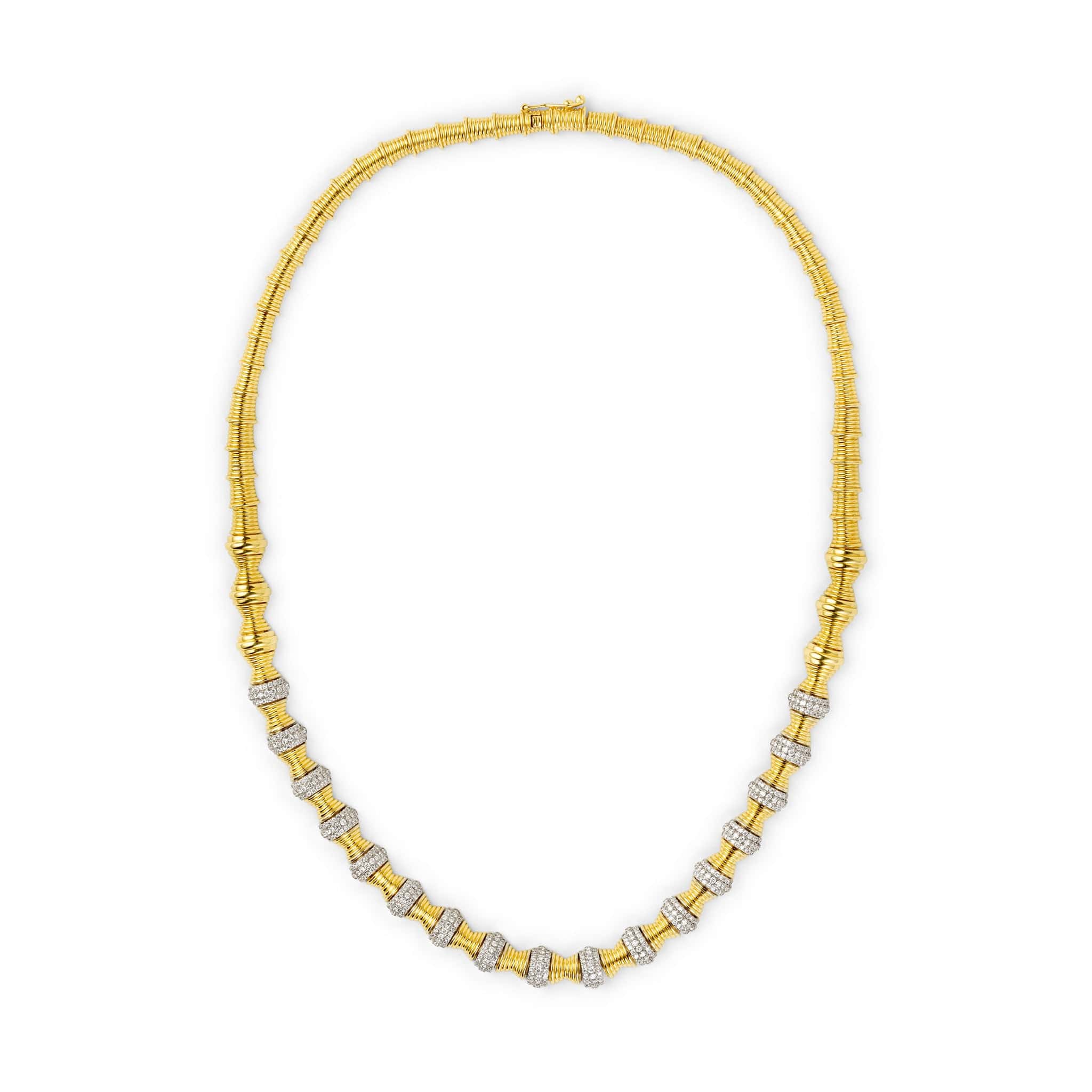 Front view of hourglass gold diamond statement necklace 