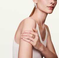 Model wearing 14k gold rope ring