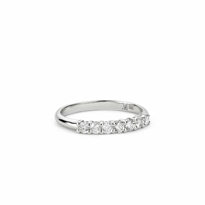 Shot of the allumare white gold diamond half band lying flat