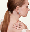 Model wearing diamond chain link earrings