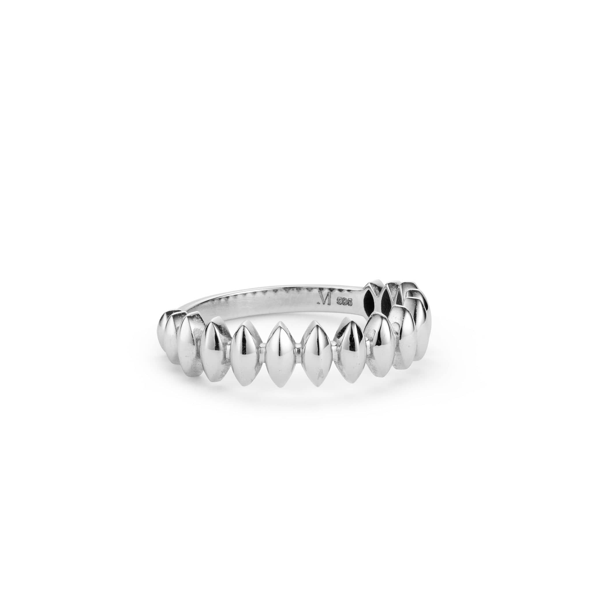 The Luna Ring with a textured, organic pattern.