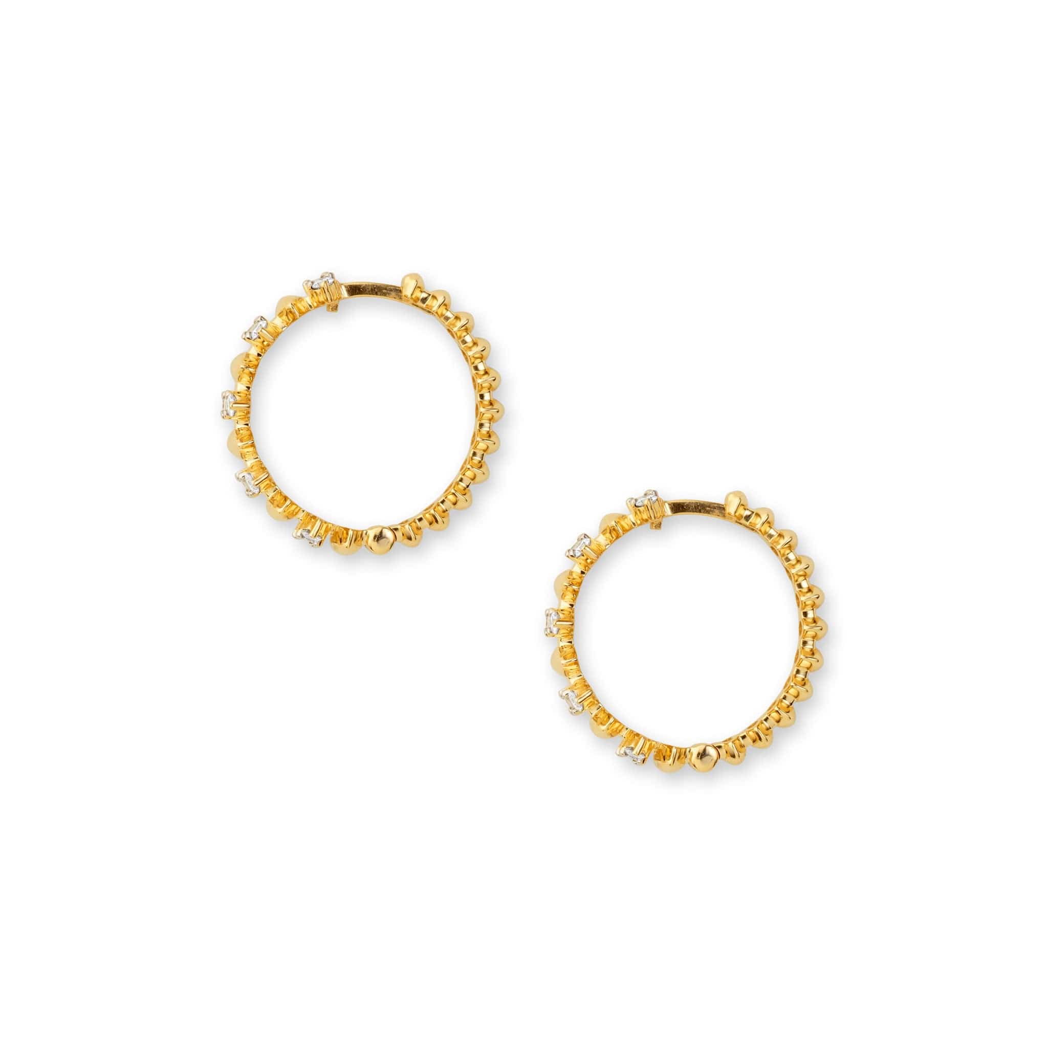 Side shot of diamond hinged hoop earrings