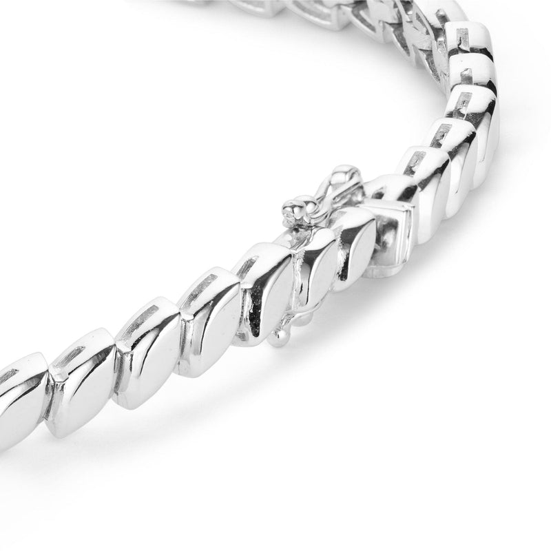 Close up view of white gold diamond leaf bracelet clasp
