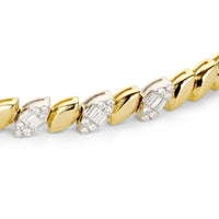 Close up shot of the yellow gold leaf diamond bracelet design