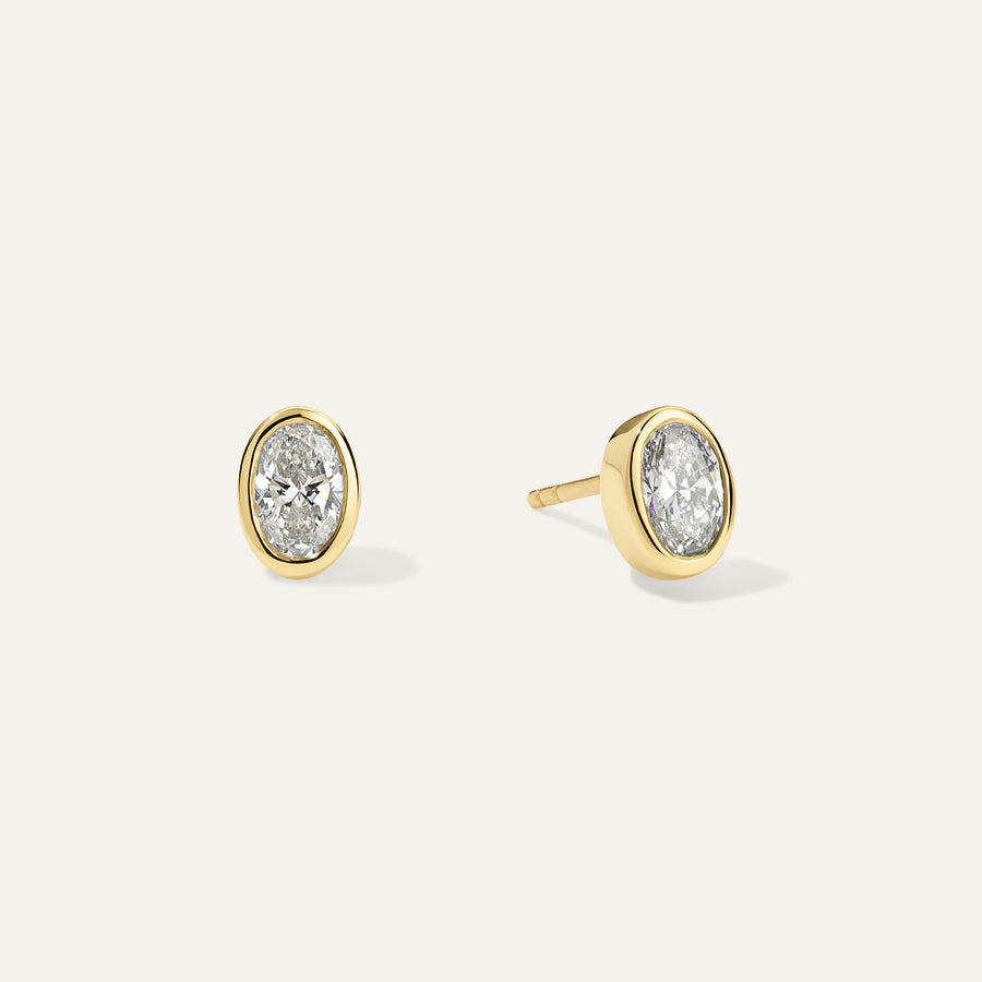 Oval Diamond Bezel Gold Stud Earrings